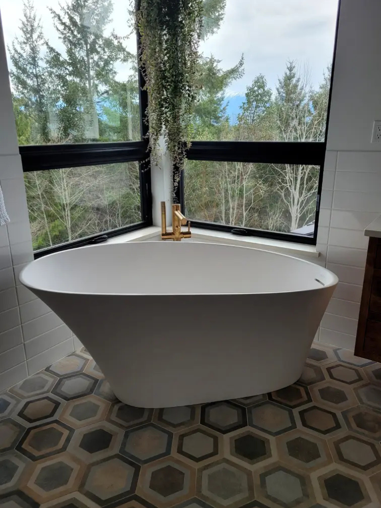 Hexagonal tile in a bathroom with freestanding tub